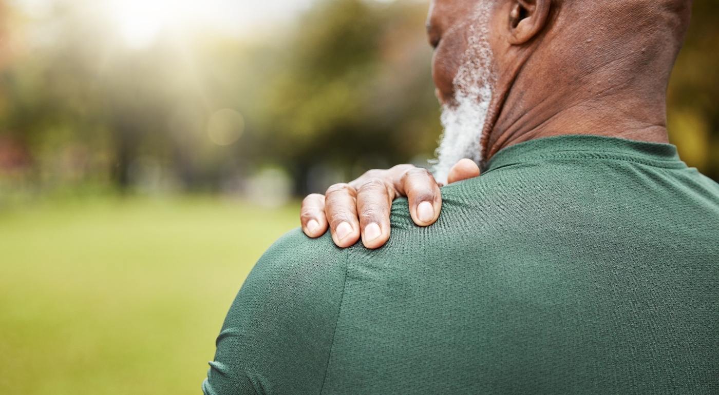 image of man with rear deltoid pain