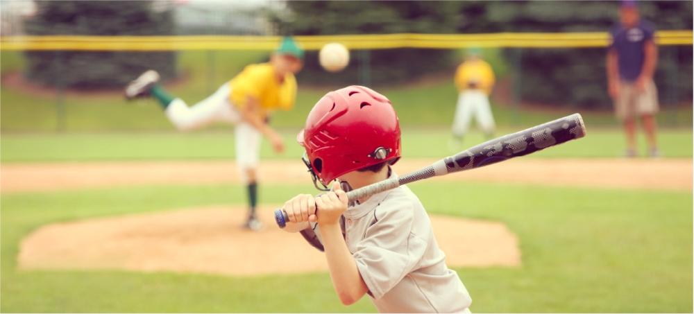 boy playing baseball