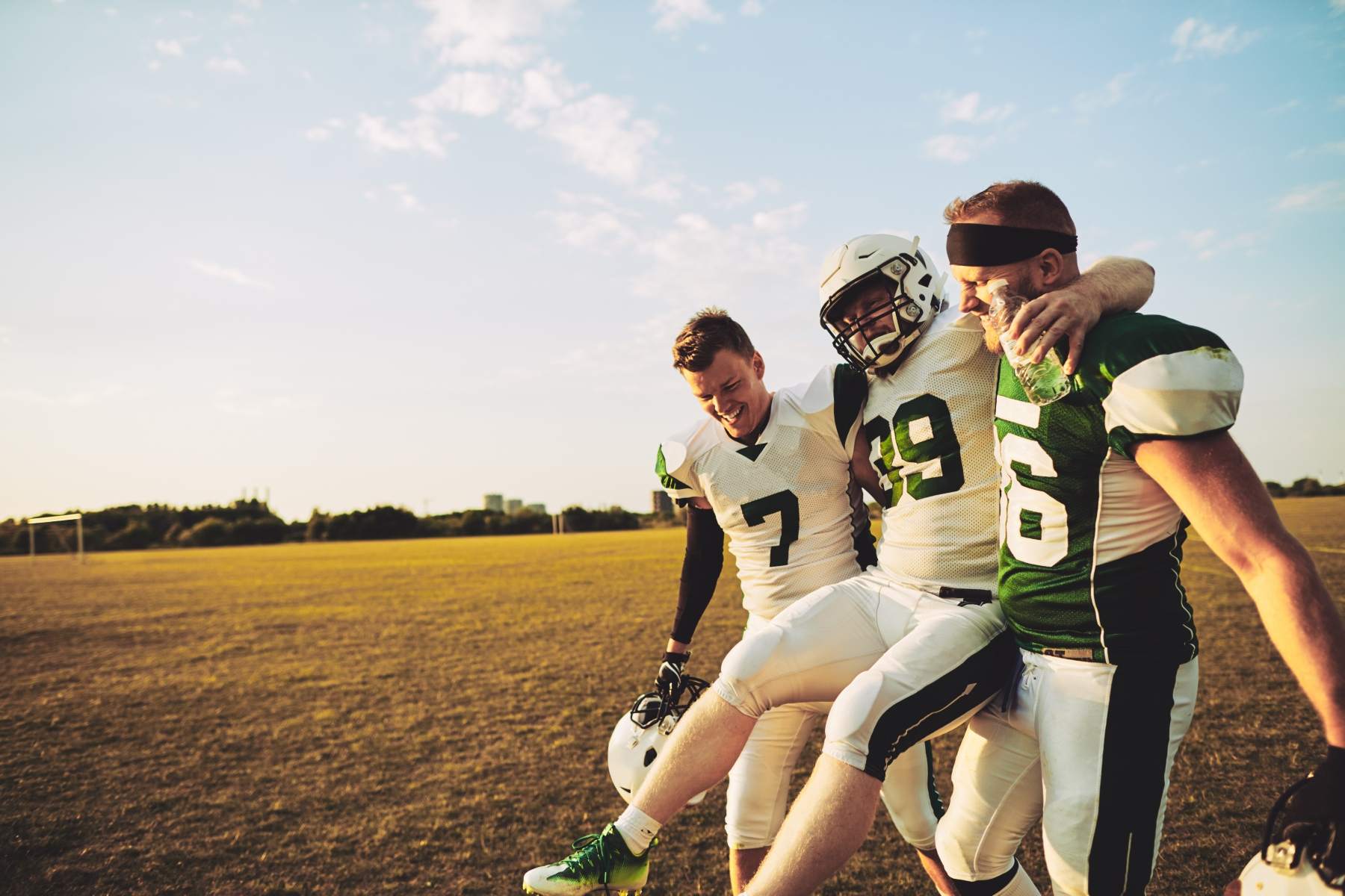 Sports Injury with football teammates